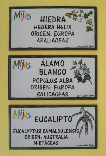  plates and tiles with names of houses and villas