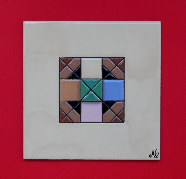 Handmade in relief with overlapping glazed ceramic pieces on tiles becoming unique beautiful decorative elements.